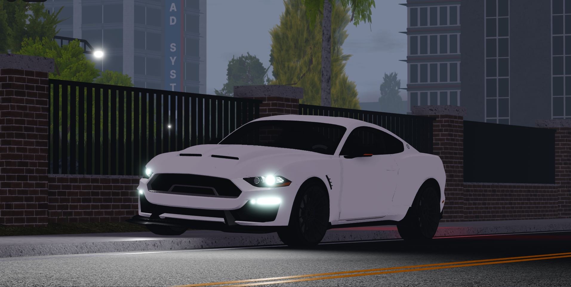 Civilian sports car parked on a city street at night